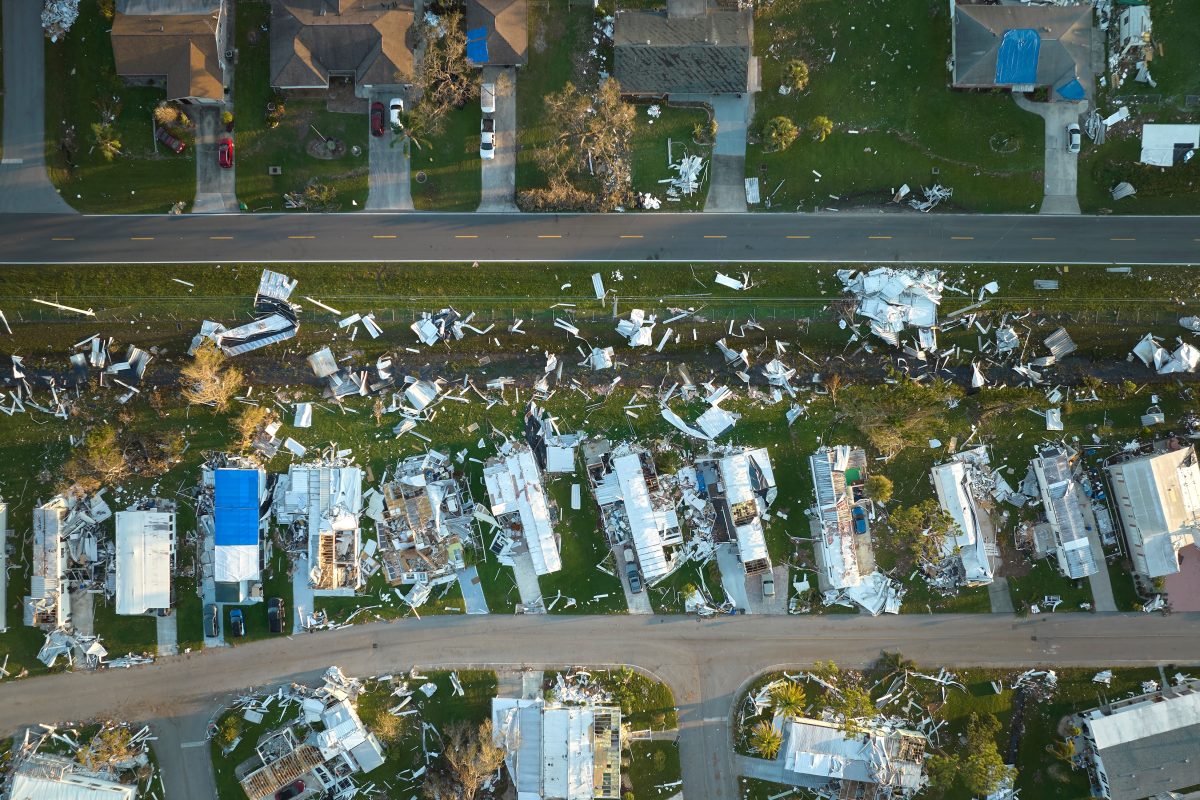 aerial view of hurricane damage in a housing development.